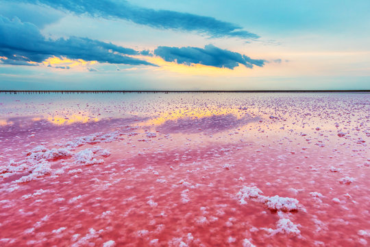 Aerial View Of Pink Lake And Sandy Beach