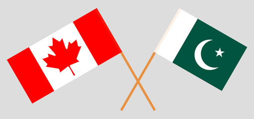 Pakistan and Canada. Crossed Pakistani and Canadian flags