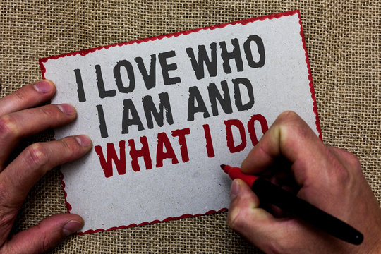 Word writing text I Love Who I Am And What I Do. Business concept for High self-stem being comfortable with your job On jute ground human hand written some texts on red bordered paper