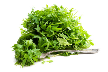 Green fresh rocket salad isolated on white