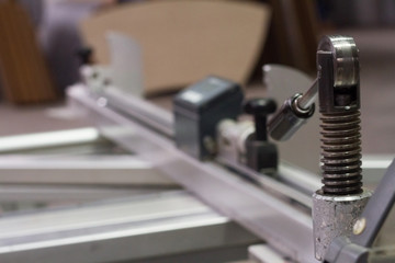 Fototapeta na wymiar Extreme close-up detail of a circular saw machine, selective focus