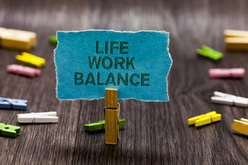 Text sign showing Life Work Balance. Conceptual photo stability person needs between his job and personal time Clips symbol idea script notice board text capital cardboard design
