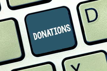 Writing note showing Donations. Business photo showcasing something that is given to charity especially sum of money Keyboard Intention to create computer message keypad idea