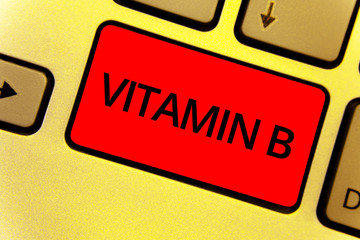 Word writing text Vitamin B. Business concept for Highly important sources and benefits of nutriments folate Keyboard key Intention create idea yellow computer brown keypad notebook