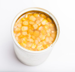 opened kernel sweet corn in brine canned , canned food isolated on white background