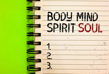 Word writing text Body Mind Spirit Soul. Business concept for Personal Balance Therapy Conciousness state of mind Written black and red text and number on white notepad green background