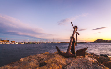 brava coast seascape with a foreground anchor - obrazy, fototapety, plakaty