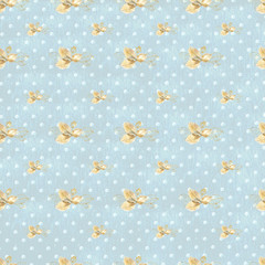 Seamless blue background with golden leaves in white polka dots. Computer-aided watercolor drawings.