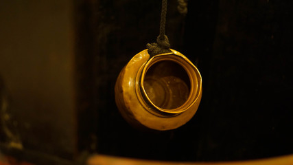 Hanging copper vessel used by Indians to disinfect natural water.