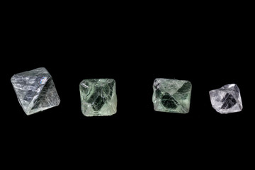 macro mineral fluorite stone on balck background