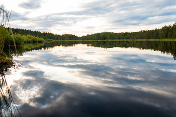 Obraz premium Beautiful evening view during the blue hour over the Safssjon lake in the region Dalarna in the middle of Sweden 