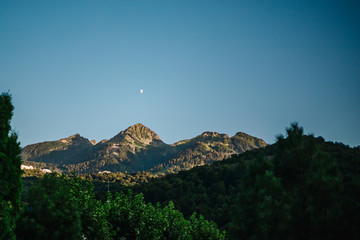evening sky mountains moon