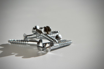 Pile of chrome plated slotted wood screws