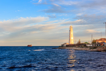 Lighthouse at Cape Tarkhankut at sunrise. Crimea.