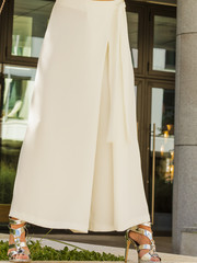 Woman wearing high heels and culottes