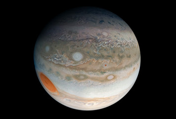 Planet Jupiter, with a big spot, on a dark background Elements of this image were furnished by NASA