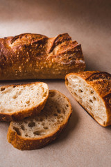 Fresh sliced bread on kraft paper. Close up.