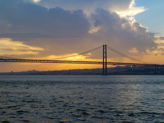 silhouette of Vasco de Gama bridge in Lisbon at dawn