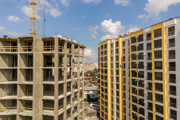 Apartment or office tall concrete building under construction.