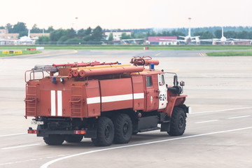 Vnukovo airport, Moscow. Fire truck at the airport on taxiways.