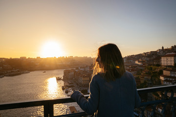 Panoramic view of Porto with amazing urban landscape. Golden hour in portuguese ancient city.