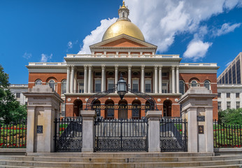 View of the Massachusetts State House with a golden dome in Boston on a sunny weekend summer...