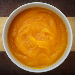 Delicious pumpkin cream soup with pumpkin seeds.