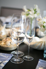 Glasses on table decoration and blur behind