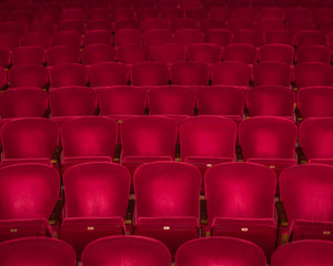 Fototapeta premium Red Velvet Seats in a Restored 1920's Movie Theatre