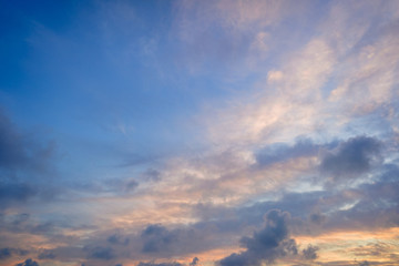 Naklejka na ściany i meble Beautiful sunset with a cloud sky and spectacular sun rays.