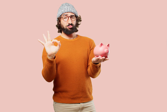 young bearded man with a piggy bank