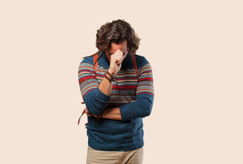 young hippie man thinking concentrated