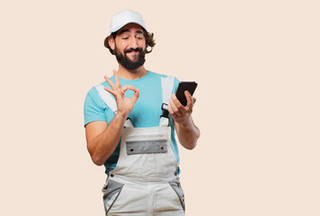 profesional painter  with a smart phone