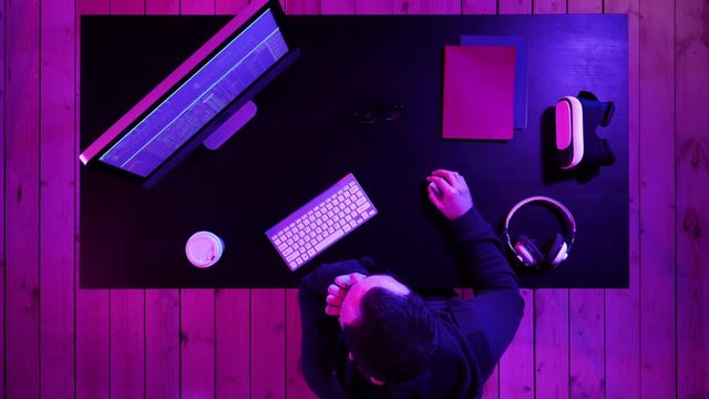 Developing programming and coding technologies. Bored programmer working.