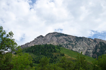 Fototapeta na wymiar The rocky peak of the grand mountain olympus in the salt lake valley. 