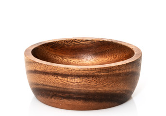 Round wooden bowl on white