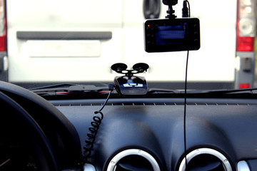 A DVR for recording traffic situations while driving a car.