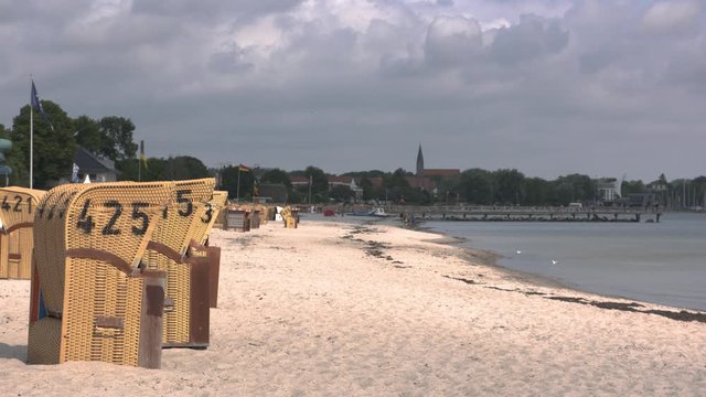 Beach chairs on a beach of the baltic sea without people in Germany