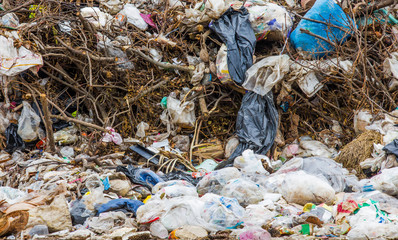 garbage dump pile in trash dump or landfill,truck is dumping the gabage from municipal,pollution concept