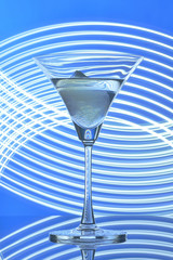 martini glass on backlight background
