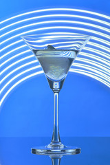 martini glass on backlight background