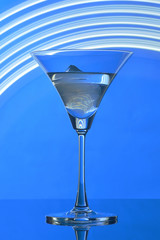 martini glass on backlight background