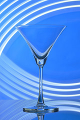 martini glass on backlight background
