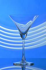 martini glass on backlight background
