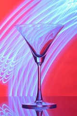 martini glass on backlight background
