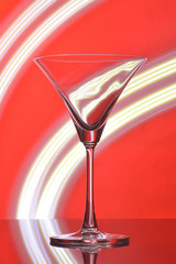 martini glass on backlight background
