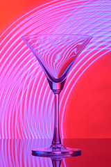 martini glass on backlight background