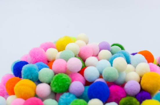 A colorful pom poms background