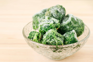 Bowl of frozen spinach.