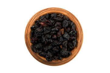 Dried barberry in a glossy cup isolated on a white background. Seasoning on isolate. View from above. Dry spices.
